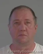 Mugshot of Jeremy Mark Aslesen booked in Nicollet County, Minnesota on March 16, 2026