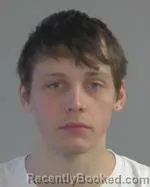 Mugshot of Caleb James Reisdorf booked in Nicollet County, Minnesota on March 17, 2026