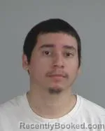 Mugshot of Roberto Andres Abugan booked in Nicollet County, Minnesota on April 14, 2026