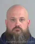 Mugshot of Dustin Dean Eisenmann booked in Nicollet County, Minnesota on April 17, 2026