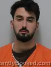 Mugshot of Giulio Guimaraes Zanqui Palombo booked in Nobles County, Minnesota on August 23, 2026