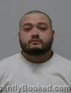 Mugshot of Brandon Michael Phomma Thyboualoy booked in Nobles County, Minnesota on October 25, 2026