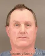 Mugshot of Jason Jeffery Minkel