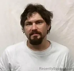 Mugshot of Justin Michael Alyn McIntire booked in Stokes County, North Carolina on April 21, 2026