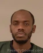 Mugshot of Daniel Monubi Okemwa