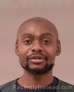 Mugshot of Carlier Yanick-Ntangsi