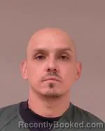 Mugshot of Andrew Lee Gomez booked in Scott County, Minnesota on March 12, 2026