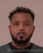 Mugshot of Siyaad Cali Shire booked in Scott County, Minnesota on March 12, 2026