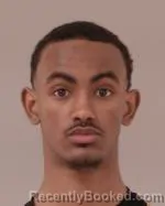 Mugshot of Kalid Abdurahman Abdullahi booked in Scott County, Minnesota on March 18, 2026