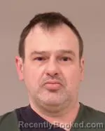 Mugshot of Daniel Edward Doucett booked in Scott County, Minnesota on March 18, 2026