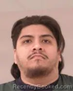 Mugshot of Jessie Joel Trejo Enriquez booked in Scott County, Minnesota on March 19, 2026