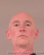 Mugshot of Riley Nelson Garvey booked in Scott County, Minnesota on March 22, 2026