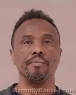 Mugshot of Ahmed Hassan Ali booked in Scott County, Minnesota on March 23, 2026