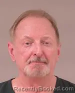 Mugshot of Steven Paul Olson booked in Scott County, Minnesota on March 24, 2026