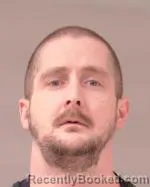 Mugshot of Justin Damien Tarrant booked in Scott County, Minnesota on March 24, 2026