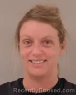 Mugshot of Lindsay Marie Lang booked in Scott County, Minnesota on March 24, 2026