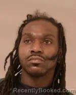 Mugshot of Calvonzo Daylon Burnett booked in Scott County, Minnesota on March 26, 2026