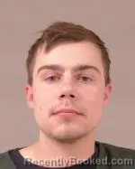 Mugshot of Logan Jack Hallet booked in Scott County, Minnesota on March 28, 2026