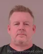 Mugshot of Sean Matthew Mangan booked in Scott County, Minnesota on March 31, 2026