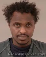 Mugshot of Kalab Moges Molla booked in Scott County, Minnesota on April 1, 2026