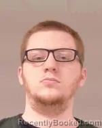 Mugshot of Cody Benjamin Rau booked in Scott County, Minnesota on April 1, 2026