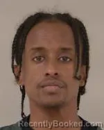 Mugshot of Houssein Mohamed Sheikh booked in Scott County, Minnesota on April 2, 2026
