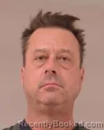 Mugshot of Eric Jason Marsh booked in Scott County, Minnesota on April 17, 2026