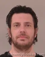 Mugshot of Justin Matthew Stein booked in Scott County, Minnesota on April 24, 2026