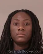 Mugshot of Noura Kareen Fassassi booked in Scott County, Minnesota on April 25, 2026