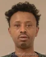 Mugshot of Mohamed Hassan Mohamed booked in Scott County, Minnesota on April 25, 2026