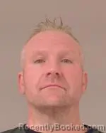 Mugshot of Carl Alan Heitman booked in Scott County, Minnesota on May 22, 2026