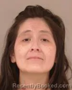 Mugshot of Elisa Madai Flores booked in Scott County, Minnesota on May 23, 2026