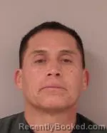 Mugshot of Jose Lucio Riquelme booked in Scott County, Minnesota on May 31, 2026