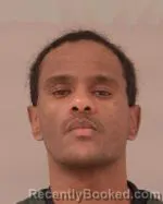 Mugshot of Mansour Essam Mahadi booked in Scott County, Minnesota on June 14, 2026
