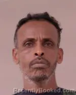 Mugshot of Afmeshar Ahmed Warsame booked in Scott County, Minnesota on July 3, 2026