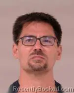 Mugshot of James William Bayer booked in Scott County, Minnesota on July 5, 2026