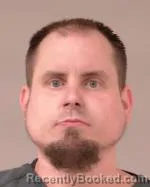 Mugshot of Dustin Robert Lovo booked in Scott County, Minnesota on July 5, 2026