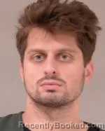 Mugshot of Nicholas Paul Chamberlain booked in Scott County, Minnesota on July 6, 2026