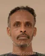 Mugshot of Afmeshar Ahmed Warsame booked in Scott County, Minnesota on July 13, 2026