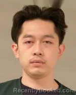 Mugshot of Kenneth Ngoc Le booked in Scott County, Minnesota on July 14, 2026