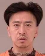 Mugshot of Koua Yang booked in Scott County, Minnesota on July 14, 2026