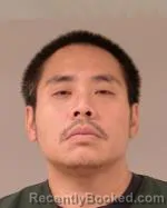 Mugshot of Shou Phillip Xiong booked in Scott County, Minnesota on July 23, 2026