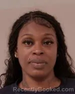 Mugshot of Tieshia Monique Moore booked in Scott County, Minnesota on July 27, 2026
