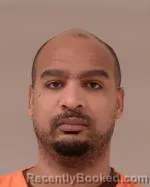 Mugshot of Earnest Demetri Simmons booked in Scott County, Minnesota on July 29, 2026