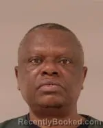 Mugshot of Festus Mwadime Nyambu booked in Scott County, Minnesota on August 9, 2026