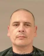 Mugshot of Louis Hepi Crowfeather booked in Scott County, Minnesota on October 25, 2026