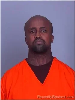 Mugshot of Khalid Mohamud booked in Sherburne County, Minnesota on August 25, 2026