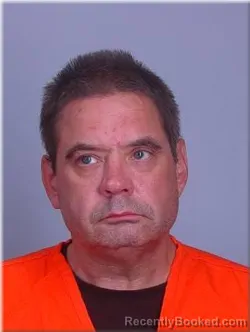 Mugshot of Christopher Olson booked in Sherburne County, Minnesota on August 29, 2026