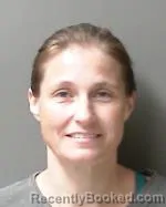 Mugshot of Lisa Marie Olson booked in Sibley County, Minnesota on October 7, 2026