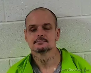 Mugshot of JASON DEWAYNE NEWMAN booked in Surry County, North Carolina on April 2, 2026